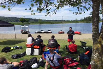 This is a picture of the Water Rescue receiving training instruction from a trainer.